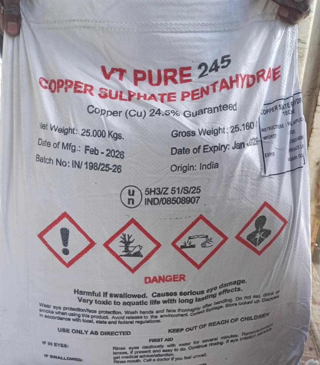 Copper Sulphate Pentahydrate blue crystalline solid in packaging